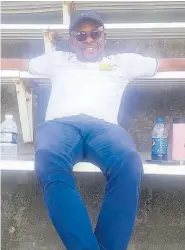  ?? RAYMOND GRAHAM ?? Titchfield High’s principal, Richard Thompson, watches their athletes from the stands at last Saturday’s Queen’s Grace Jackson Invitation­al meet.