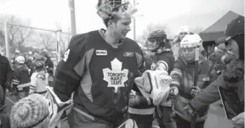  ??  ?? Netminder James Reimer attracts plenty of attention as he exits Wednesday’s outdoor practice.