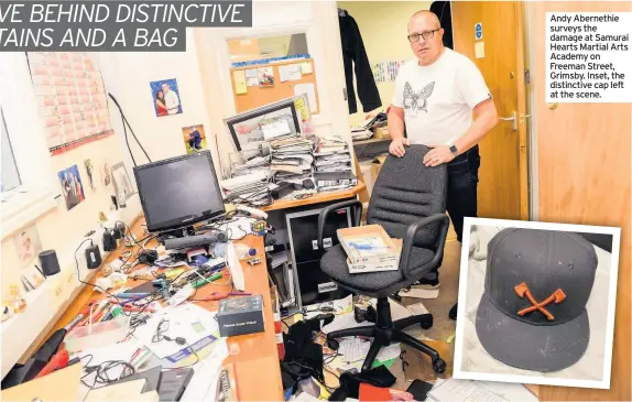  ??  ?? Andy Abernethie surveys the damage at Samurai Hearts Martial Arts Academy on Freeman Street, Grimsby. Inset, the distinctiv­e cap left at the scene.