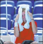  ?? The Associated Press ?? Patrick Semansky
Daniil Medvedev of the Russian Olympic Committee cools off during his opening match at the Tokyo Olympics on Saturday.