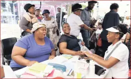  ??  ?? ALL CLEAR: Some Soweto residents getting checked for among others, diabetes, at Maponya Mall.