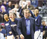  ?? Stephen Dunn / Associated Press ?? UConn coach Geno Auriemma watches his team during the first half against Vanderbilt on Nov. 17.