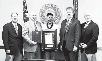  ??  ?? From left: FBI Special Agent Frank Gasper, Assistant United States Attorney Claire Hochhalter, Detective Woman Corporal Nashema Newell, Assistant United States Attorney James Thomas, and United States Marshal Dan Orr.