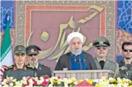  ?? IRANIAN PRESIDENCY OFFICE VIA AP ?? Iranian President Hassan Rouhani speaks at a military parade Sunday marking the 39th anniversar­y of the outset of the Iran-Iraq war.