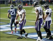  ?? MARK ZALESKI — THE ASSOCIATED PRESS ?? Baltimore Ravens running back J.K. Dobbins (27) celebrates after scoring a touchdown against the Tennessee Titans in the second half of an NFL wild-card playoff football game Sunday, in Nashville, Tenn.
