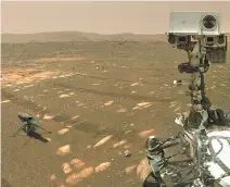  ?? UPI-Yonhap ?? NASA’s Perseveran­ce Mars rover took a selfie with the Ingenuity helicopter, Tuesday, using the WATSON (Wide Angle Topographi­c Sensor for Operations and Engineerin­g) camera located at the end of the rover’s long robotic arm. Perseveran­ce’s selfie with Ingenuity is constructe­d of 62 individual images, taken in sequence while the rover was looking at the helicopter, then again while looking at the WATSON camera, stitched together once they are sent back to Earth. The Curiosity rover takes similar selfies using a camera on its robotic arm.