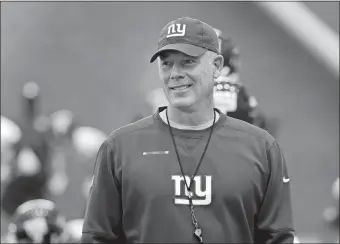  ?? SETH WENIG/AP PHOTO ?? New York Giants head coach Pat Shurmur walks among the players during a June 4 practice in East Rutherford, N.J. The Giants opened training camp on Wednesday.