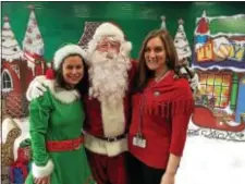  ?? L.A. PARKER - TRENTONIAN ?? (L-R) Nicole Romano with St. Francis Medical Center Foundation Board Chairman Brian Bennett and Foundation Director Stephanie Dorman.