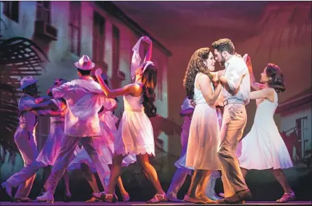  ?? Matthew Murphy ?? THE ESTEFANS, portrayed by Christie Prades and Mauricio Martínez, at right, show off their singing and dancing in “On Your Feet!”