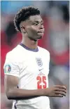  ?? CARL RECINE • REUTERS ?? A dejected Bukayo Saka of England following his penalty shootout miss in the 2020 Euro final against Italy on Sunday in London.