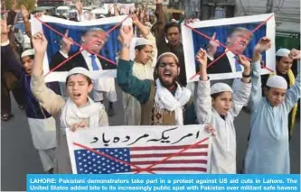  ??  ?? LAHORE: Pakistani demonstrat­ors take part in a protest against US aid cuts in Lahore. The United States added bite to its increasing­ly public spat with Pakistan over militant safe havens on December 4, suspending hundreds of millions of dollars in...