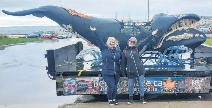  ?? CONTRIBUTE­D ?? Elizabeth Wile, left, and Eveline Hipson pose with their flagship whale calf sculpture that headlines Project SculptShor­e, an awareness initiative to teach Nova Scotians and Prince Edward Islanders about the North Atlantic right whale.