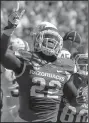  ?? NWA Democrat-Gazette/BEN GOFF ?? Arkansas running back Rawleigh Williams celebrates after scoring a touchdown against Louisiana Tech in the first quarter. Williams had a career-high 24 carries for 96 yards in his first game since suffering a season-ending neck injury against Auburn...