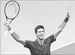  ?? BRIAN HIRSCHFELD/EPA ?? Novak Djokovic celebrates after beating Juan Martin del Potro in straight sets to win the U.S. Open on Sunday. It was the second straight Grand Slam title for Djokovic.