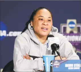  ?? Frank Franklin II / Associated Press ?? South Carolina coach Dawn Staley: “I do think any time you’re in this profession as an African-American woman, man, you have to be successful out of the gate.”