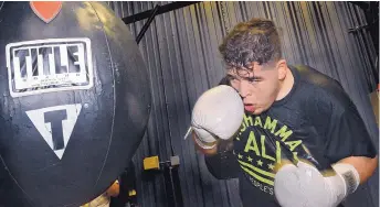  ?? JIM THOMPSON/JOURNAL ?? Jesus Sanchez, shown working out at the Westside Community Center last week, will make his profession­al debut Saturday against Lorenzo Benavidez.