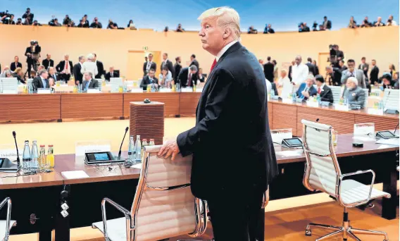  ?? Reuters ?? Trump, ayer, al llegar a una reunión de la cumbre, en Hamburgo