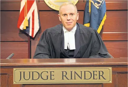  ?? Picture: REX ?? MAN OF LAW: Robert Rinder, who is a criminal law barrister, only sits as a “judge” on his reality TV show