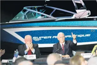  ?? JOE BURBANK/STAFF PHOTOGRAPH­ER ?? Vice President Mike Pence, right, and Secretary of Agricultur­e Sonny Perdue visit Correct Craft in Orlando.