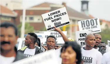  ?? Picture: THULI DLAMINI ?? ENOUGH IS ENOUGH: Protesters march in Durban against high fuel prices