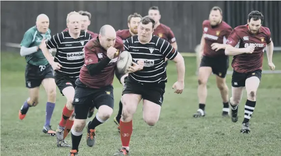  ??  ?? Houghton RFC (claret) on their way to a 12-10 win against Darlington at Dairy Lane on Saturday.