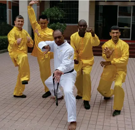  ?? ?? Pita Ramasima with other army officers from around the world learning the Chinese Wushu in China, in 2012.