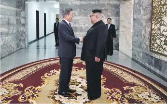  ?? EPA ?? South Korean President Moon Jae-In and North Korean leader Kim Jong-un ahead of their second summit in Panmunjom on the North Korean side of the demilitari­sed zone yesterday