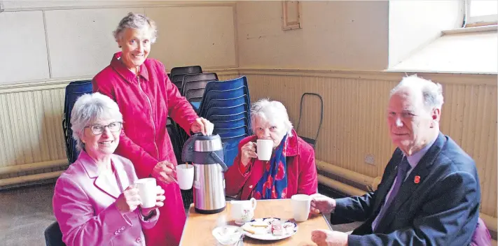  ?? ?? Time for tea After-service refreshmen­ts resumed at Blairgowri­e Parish Church on Sunday, when Dorothea Cooke provided table service for, from left, Colleen Joslin and Jean and Jim Gibb. Pics: David Phillips