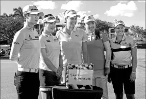  ?? DOUG FERGUSON / AP ?? LPGA stars (from left) Park Sung-hyun, Ryu So-yeon, Lexi Thompson, Feng Shanshan and Brooke Henderson pose on Tuesday with a glass case holding the $1 million cash bonus up for grabs at this week’s CME Group Tour Championsh­ip at Tiburon Golf Club in...