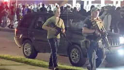  ?? ADAM ROGAN/
THE JOURNAL TIMES VIA AP ?? RIGHT: Kyle Rittenhous­e ( left) walks in Kenosha, Wis., on Aug. 25 before he fatally shot two people protesting the police shooting of Jacob Blake.