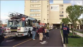  ?? EVAN BRANDT — MEDIANEWS GROUP ?? Emergency responders line up in front of Pottstown Hospital to salute the front-line medical workers there putting their lives on the line to fight coronaviru­s.