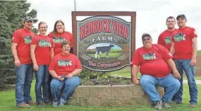  ?? REDROCK VIEW FARMS ?? The Carpenter family of Redrock View Farms poses for a picture. Like a vast majority of Wisconsin dairy farms, Redrock is family-owned, and everyone is pitching in to keep their cattle comfortabl­e during this week's intense heat.