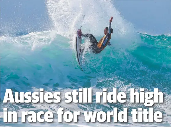  ??  ?? SPLASHING OUT: Australia’s Sally Fitzgibbon­s lost her semi-final at the World Surf League event in Hossegor but she still remains top of the standings.