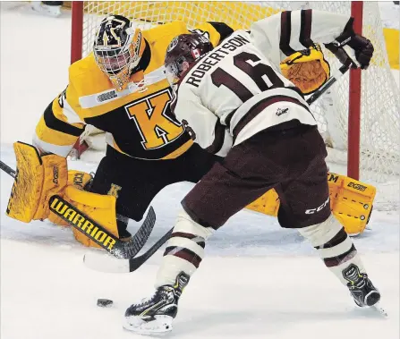  ?? CLIFFORD SKARSTEDT EXAMINER ?? Peterborou­gh Petes’ Nick Robertson scores on Kingston Frontenacs goalie Brendan Bonello during first period Ontario Hockey League action on Thursday night at the Memorial Centre. Robertson had a hat trick and two assists as the Petes won 8-2 to snap a two-game losing streak.