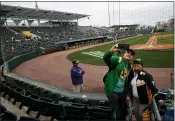  ?? RANDY VAZQUEZ — BAY AREA NEWS GROUP ?? Conn and Gina McLean take a photo before the Cactus League game between the Oakland Athletics and San Francisco Giants begins at Hohokam Stadium in Mesa, Ariz., on Feb. 23, 2020.