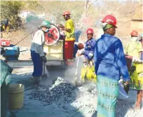  ?? — Picture: Tinai Nyadzayo ?? Women working at Nyanga Resources Mine are not intimidate­d by their labour intensive jobs.