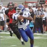  ?? Marc Mahnke /
Southeast Missouri State ?? Shorter’s Aaron Bryant rolls out Saturday against Southeast Missouri State. The Hawks won 26-21.