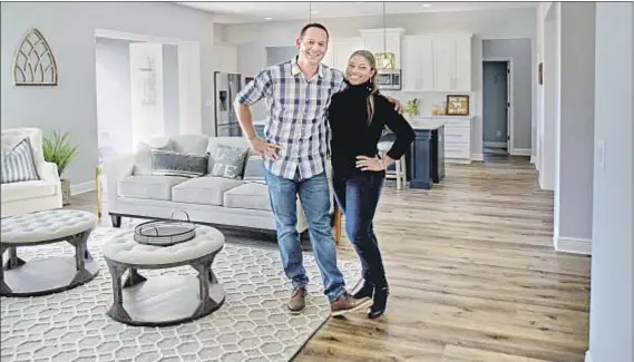  ?? HGTV ?? “WE’RE NOT JUST slapping these up for a TV show. These are people’s dream homes,” says Brian Kleinschmi­dt, with wife Mika.