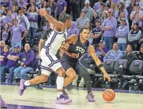  ?? SCOTT SEWELL/USA TODAY SPORTS ?? TCU guard Jameer Nelson Jr. dribbles against Kansas State guard Dai Dai Ames during the second half Saturday.