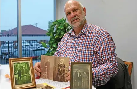  ?? Photo: Alexia Austin ?? A WINE TRADITION: Jim Beh with photos of his great-grandfathe­r and mother, who were some of Toowoomba’s first settlers.