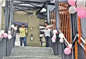  ?? — DC ?? People take pictures on the new foot overbridge which was inaugurate­d at Punjagutta in Hyderabad on Wednesday.