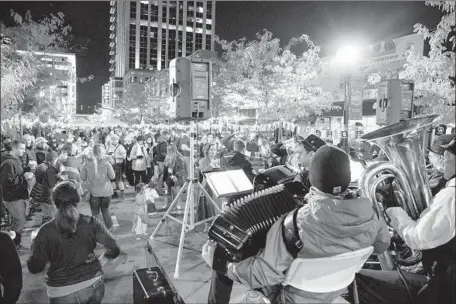  ?? Photograph­s by Otto Kitsinger For The Times ?? GROWTH SPURTS have more than doubled the population of Boise, Idaho, since the 1980 census. Above, an Octoberfes­t event in Boise.