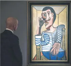  ??  ?? Jordan looking at Pablo Picasso’s ‘Le Marin’ during a media preview of Christie’s Hong Kong Spring Sales in Hong Kong. — AFP photo