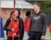  ?? PHOTO COURTESY BERNI KUCEWICZ ?? Owen J. Roberts senior Savanna Sachar, left, is congratula­ted by fellow OJR pole vaulter Jake Canale, who won the boys’ event, after clearing a schoolreco­rd 11-3 in the girls’ pole vault against Boyertown.