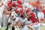  ?? BY IAN MAULE, TULSA WORLD] [PHOTO ?? Oklahoma hopes to play Texas in the Big 12 Championsh­ip game. To do that, though, the Sooners will need to beat a good West Virginia team on Friday in Morgantown.