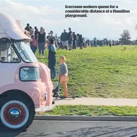  ??  ?? Icecream-seekers queue for a considerab­le distance at a Hamilton playground.