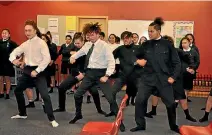  ??  ?? Te Haeta Waitaiki-Rawari (centre) led a spirited haka to greet Tim Macindoe.