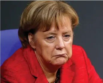  ??  ?? The misery worsens: Her face crumples as her future in office looks more in peril