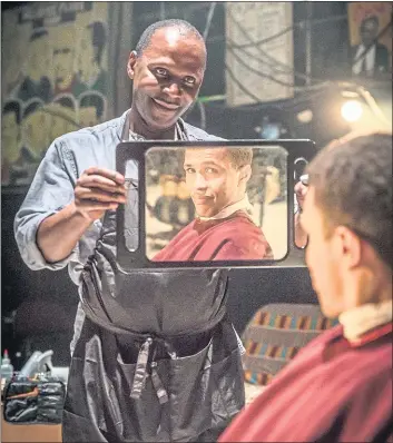  ?? PHOTOS BY MARC BRENNER ?? Reflection­s of the male psyche are among the things playgoers will witness in Inua Ellams’ “Barber Shop Chronicles.” Above, Cyril Nri and Kwami Odoom in the London production.