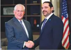  ?? AP ?? Sa’ad Hariri (right) greets Rex Tillerson at the government palace in Beirut yesterday. Tillerson’s visit comes at a time of tension between Lebanon and Israel over Hezbollah’s role.